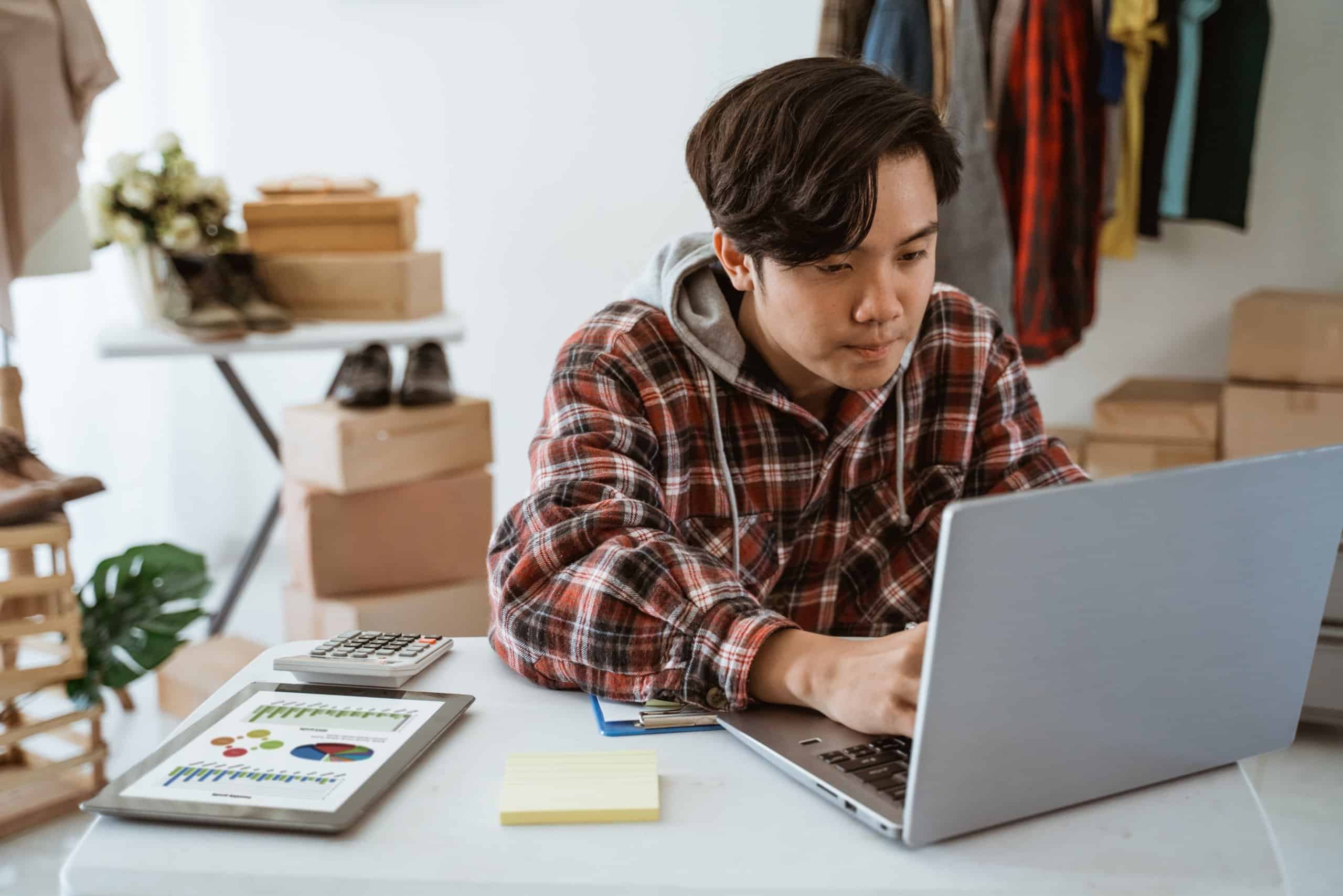 Dropshipping business owner working in his office