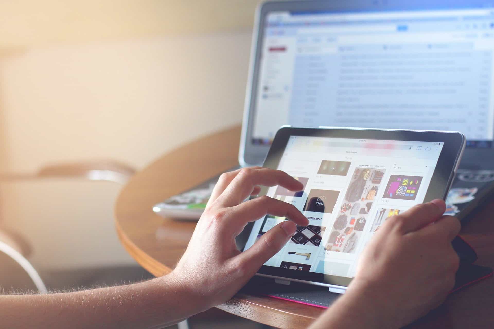 Person holding tablet