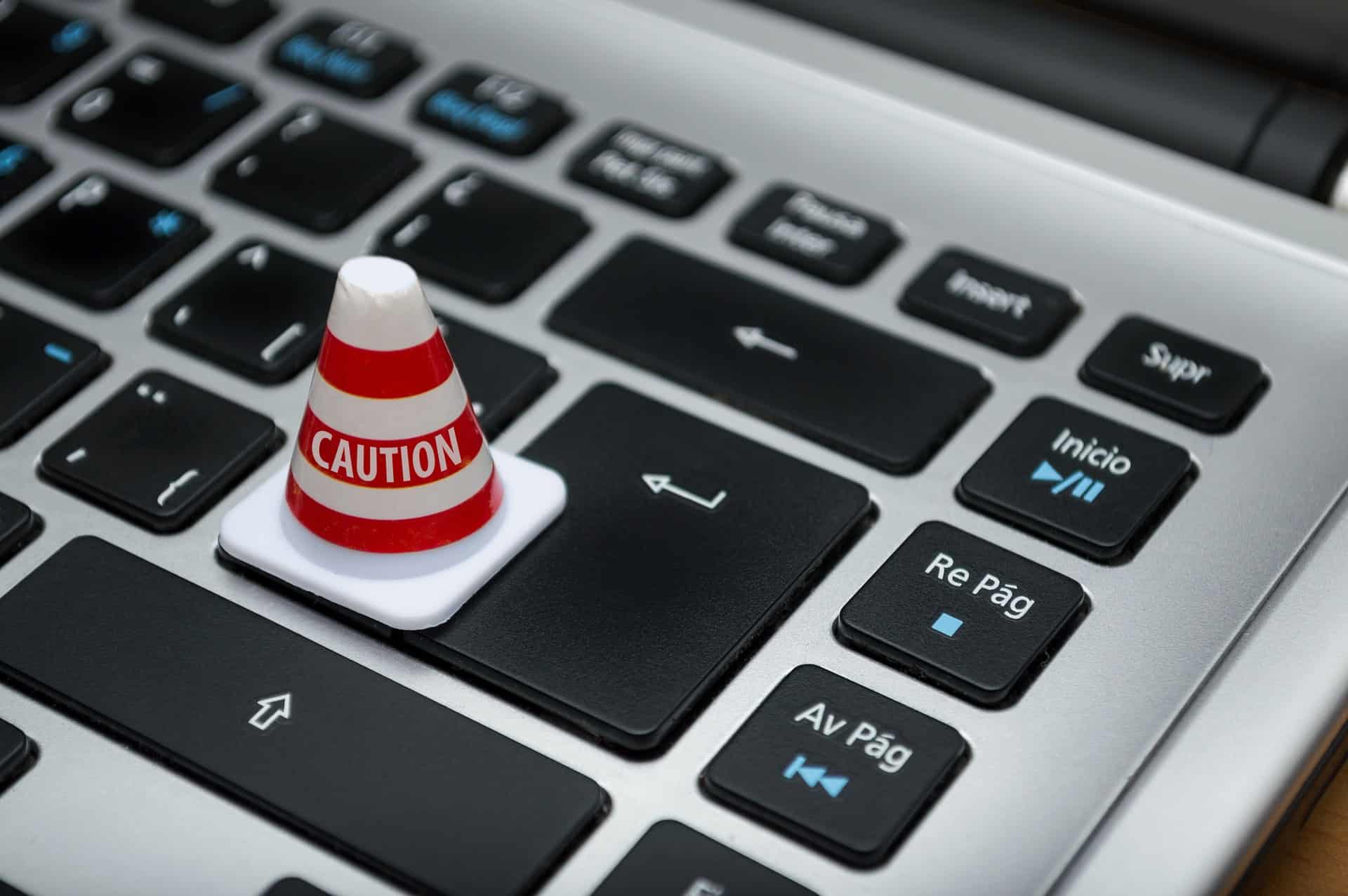 White caution cone on keyboard