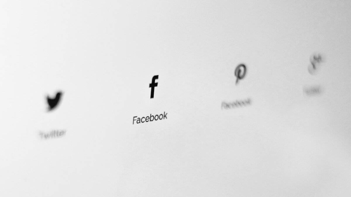 Social media icons on paper