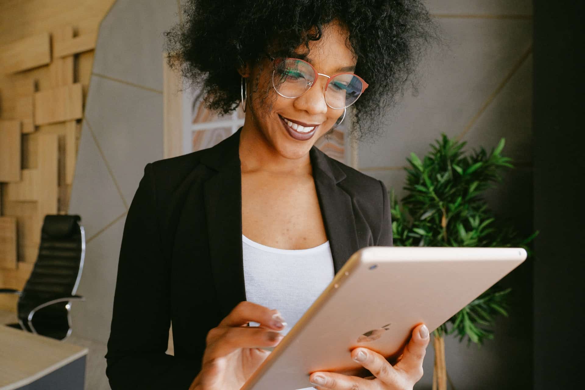 Woman using tablet happy