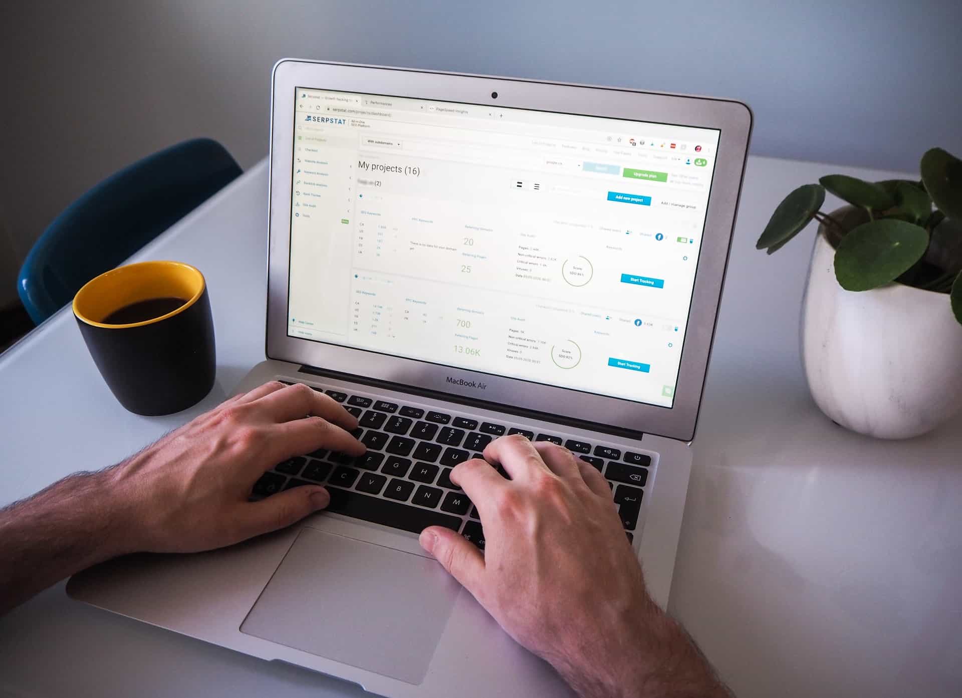 Person using laptop to view Google Analytics