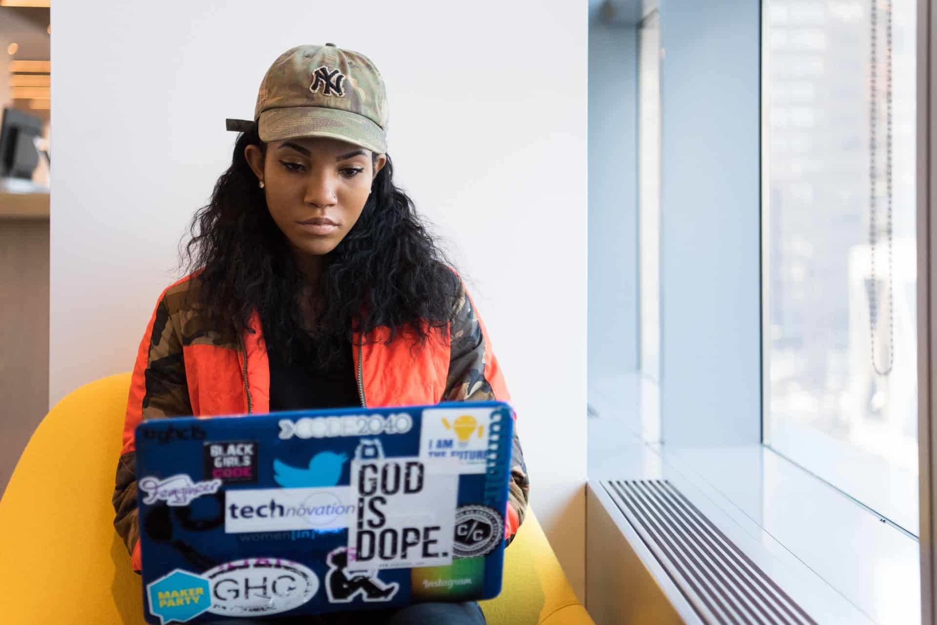 Woman focused on laptop