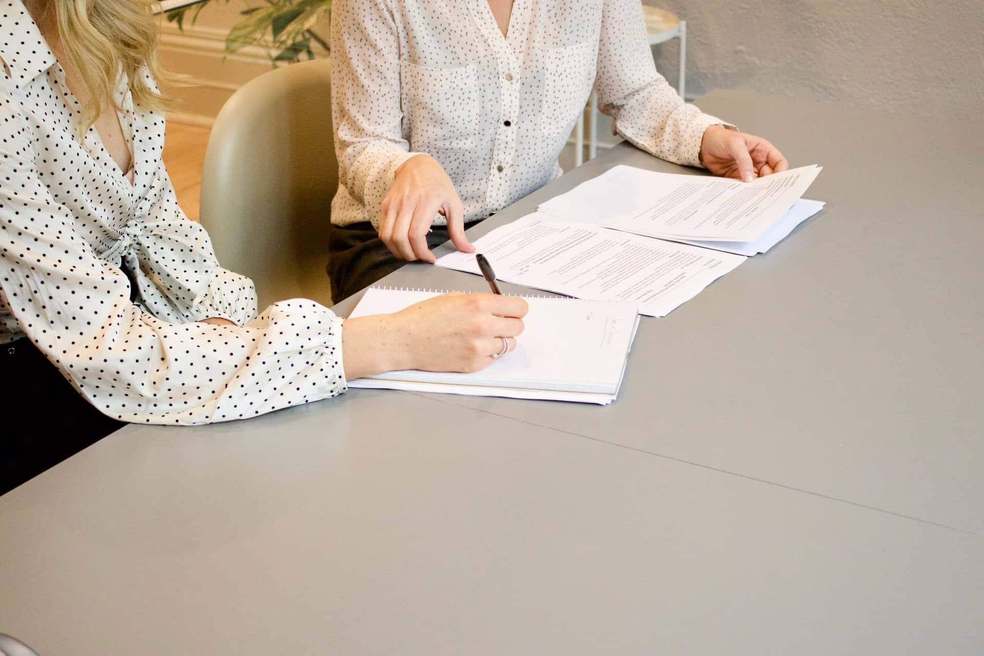 Woman signing documents