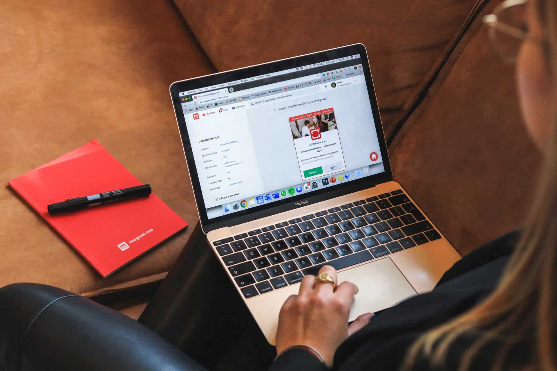 Woman with laptop in lap