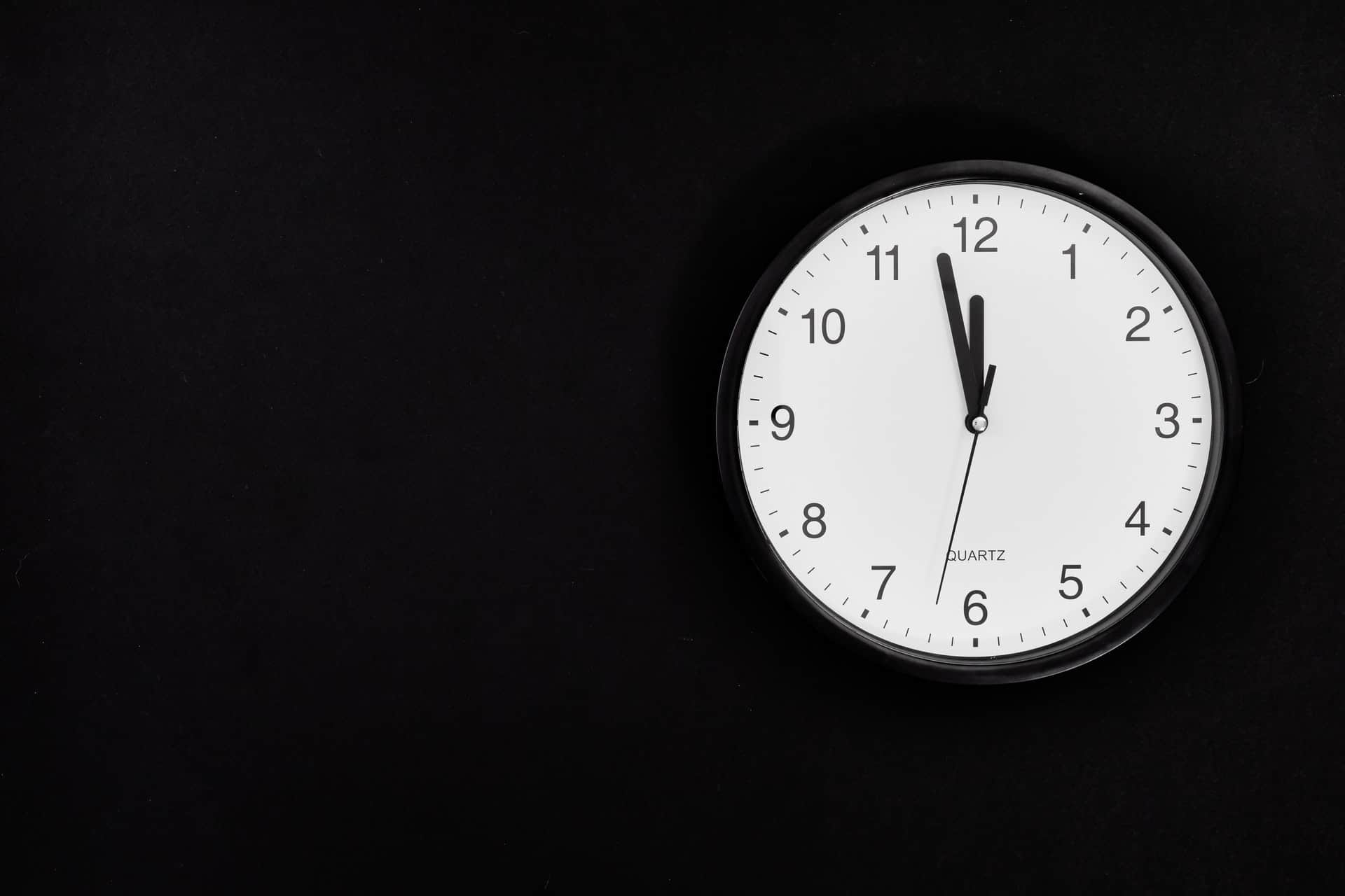 Clock on black wall