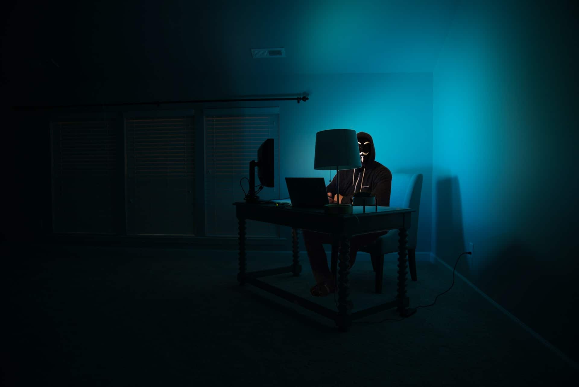 Hacker in dark room