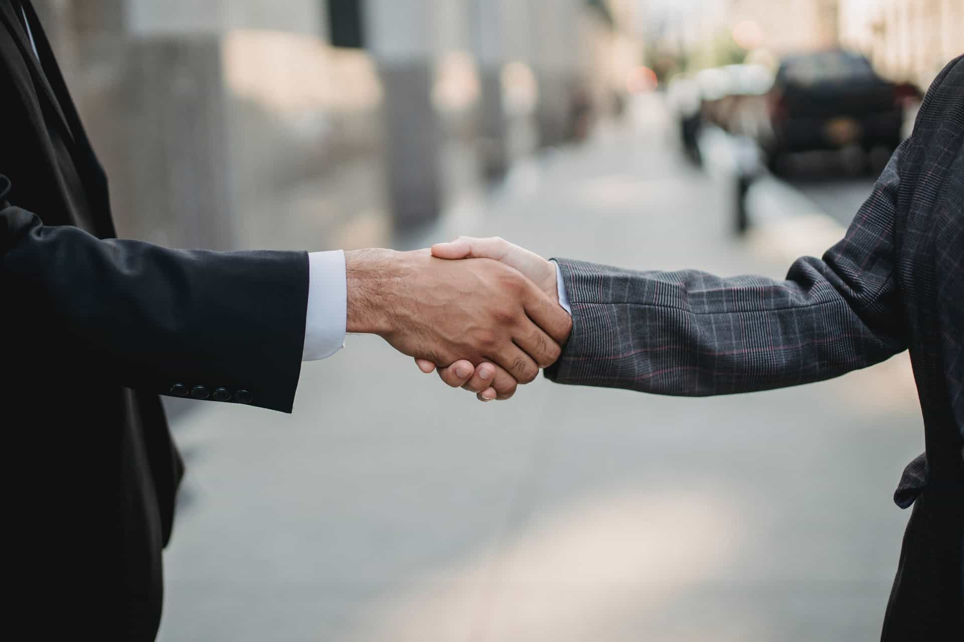 Business people shaking hands