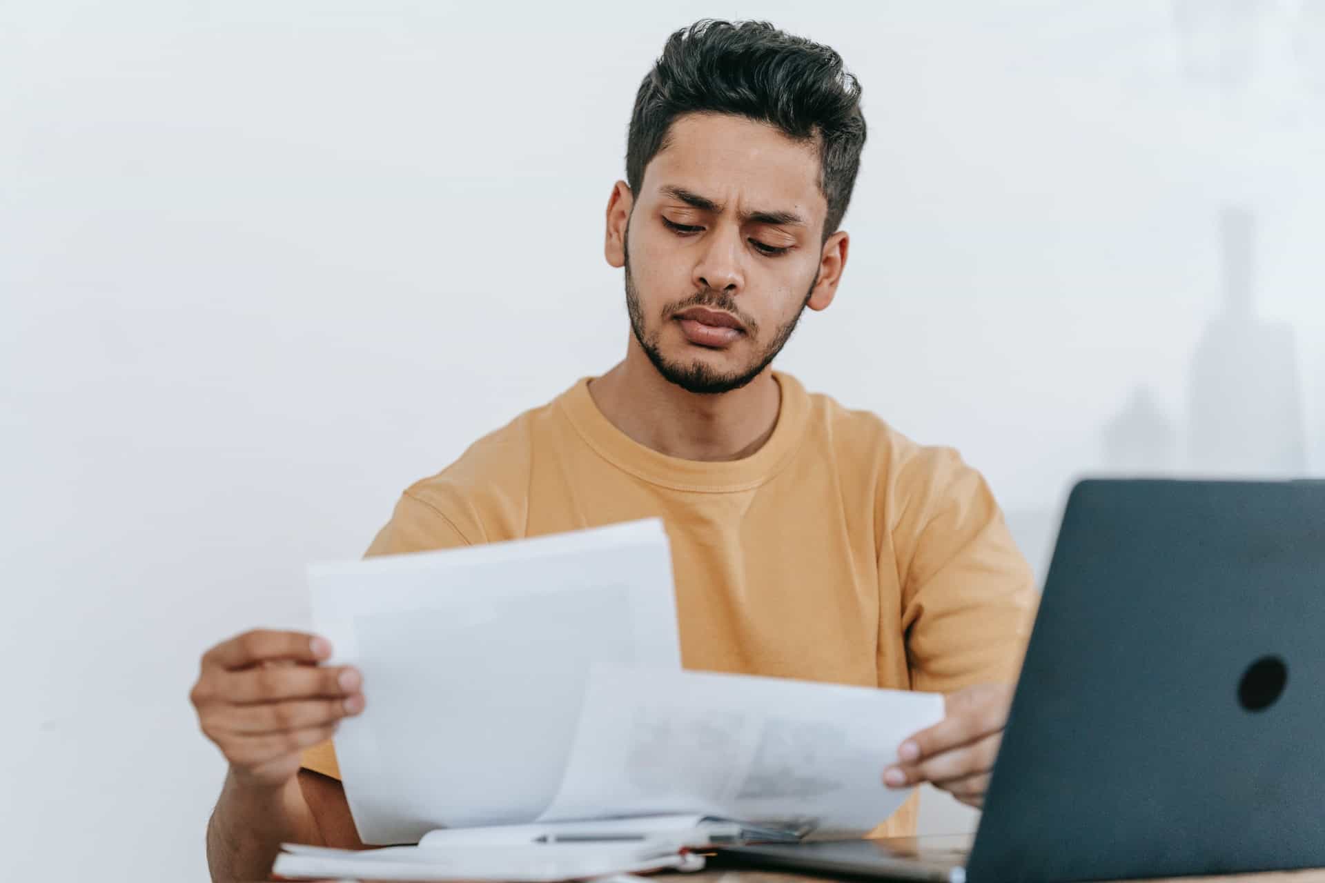 Man looking at papers