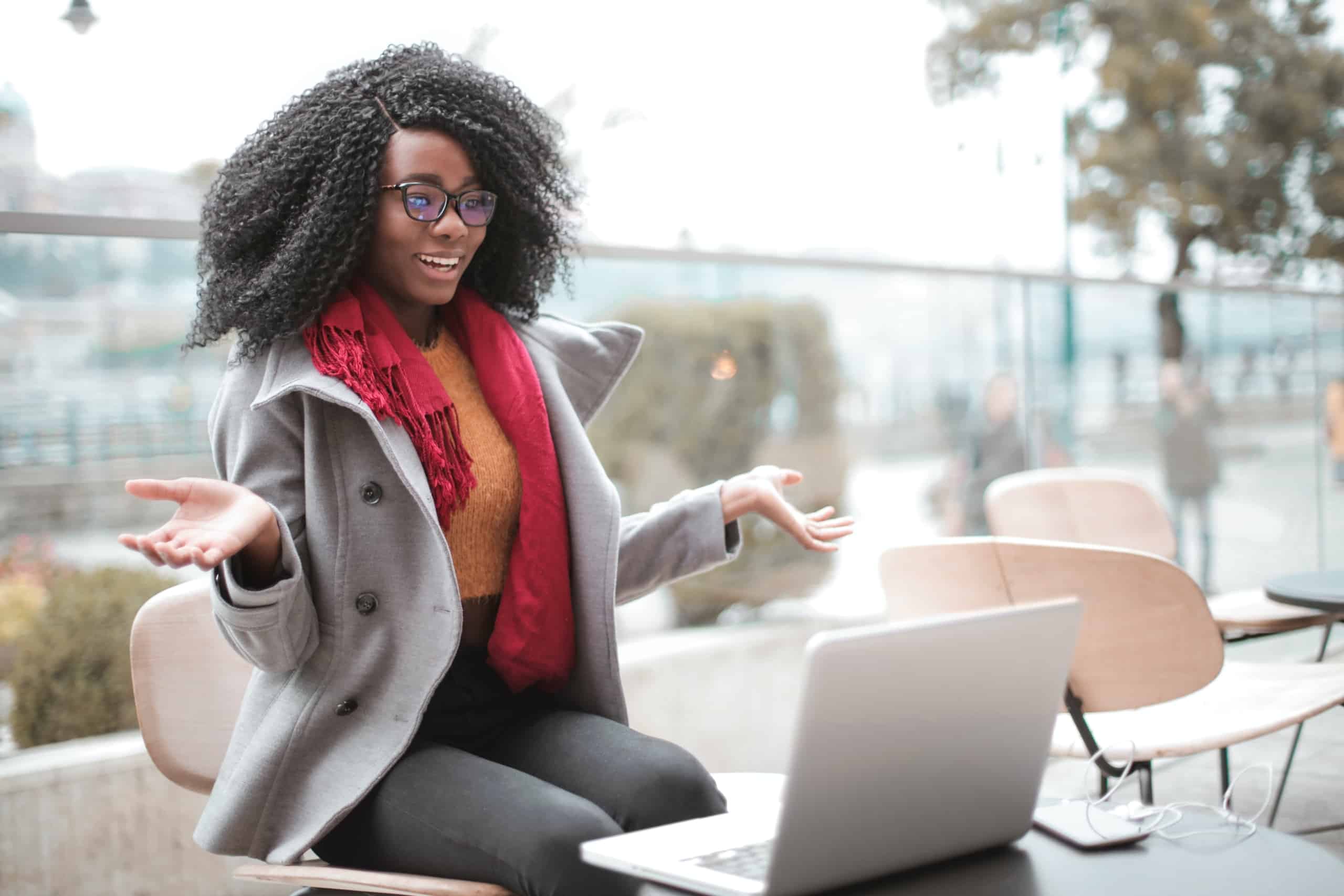 Woman sitting with laptop