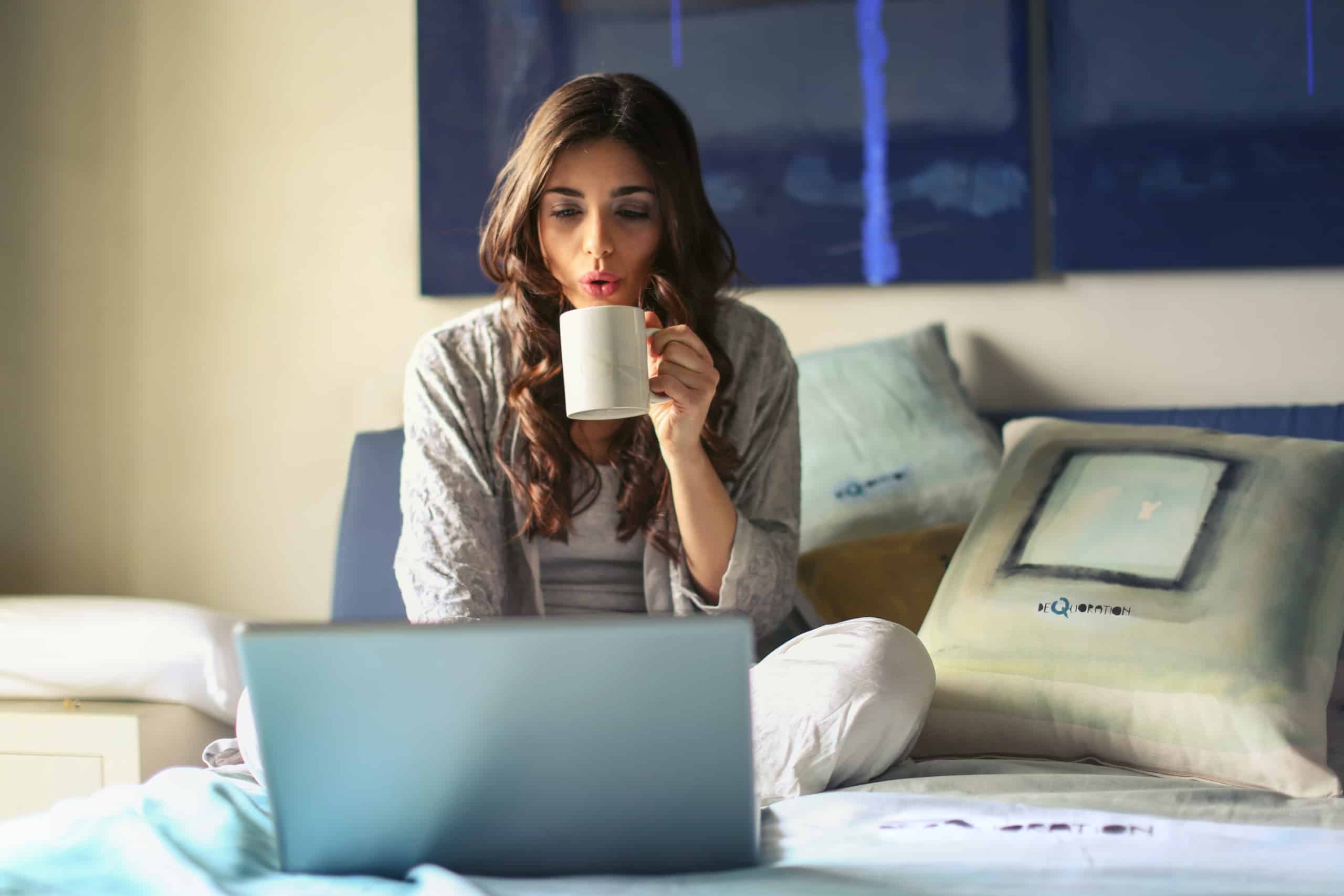 Woman uses laptop